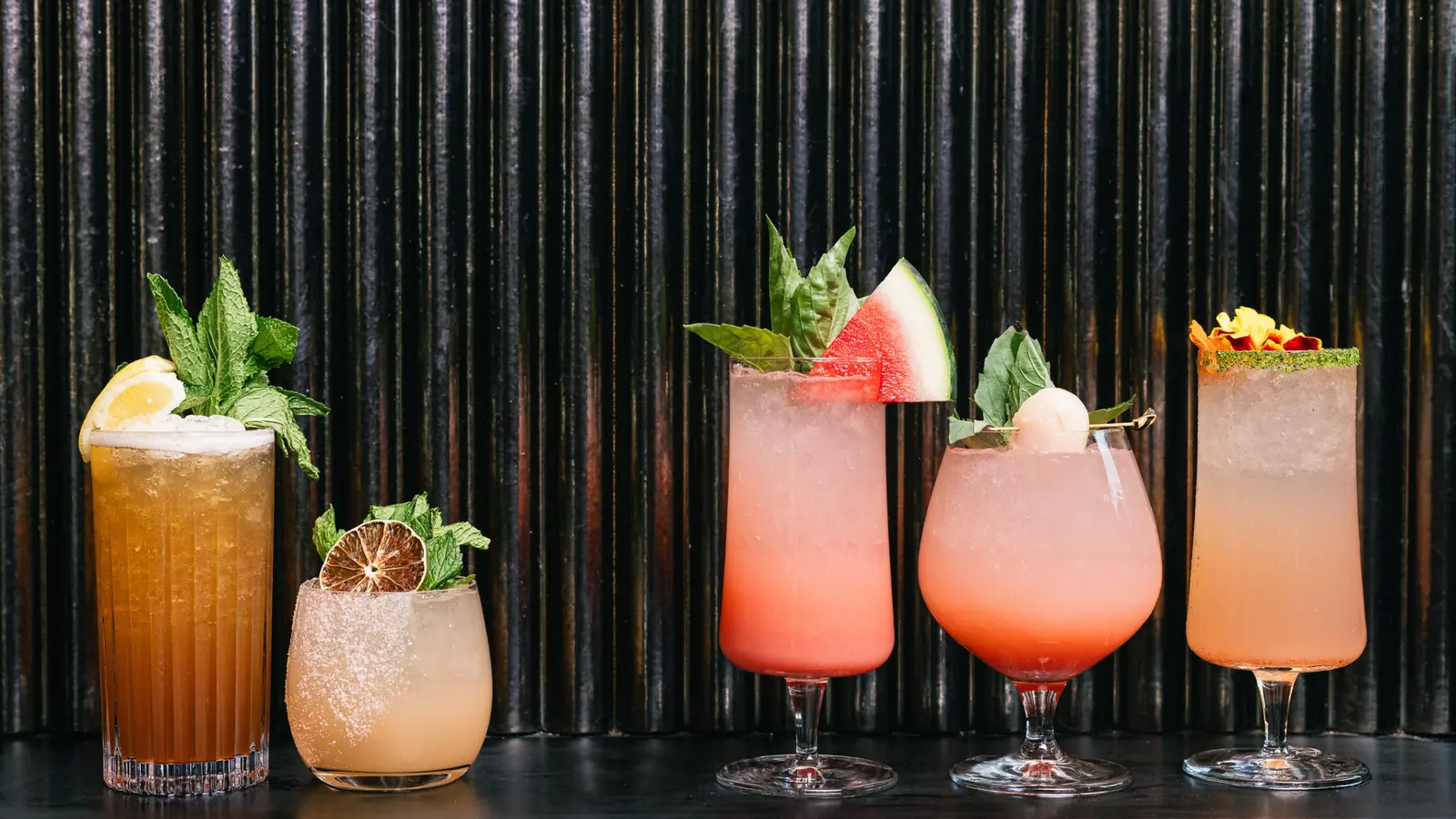 Lineup of five signature cocktails